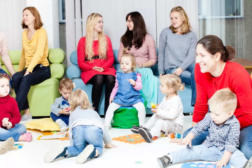 rear-view-people-sitting-floor