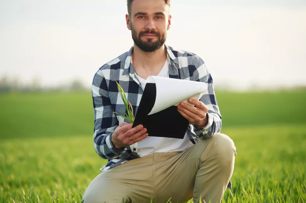 handsome-young-man-is-agricultural-field
