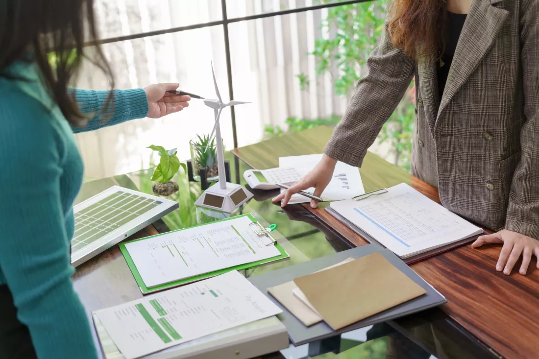 solar-panels-green-energy-business-people-working-green-eco-friendly-office-business-meeting