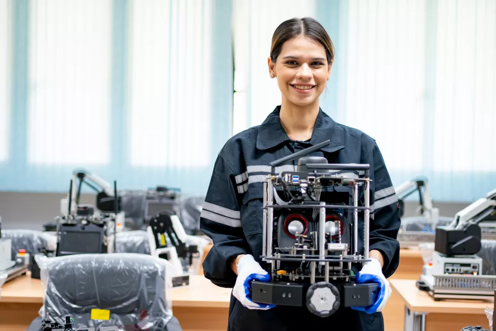 female-engineer-check-control-automation-robot-arms-machine-intelligent-factory-industrial-real-time-monitoring-system-software-robotics-digital-manufacturing-operation