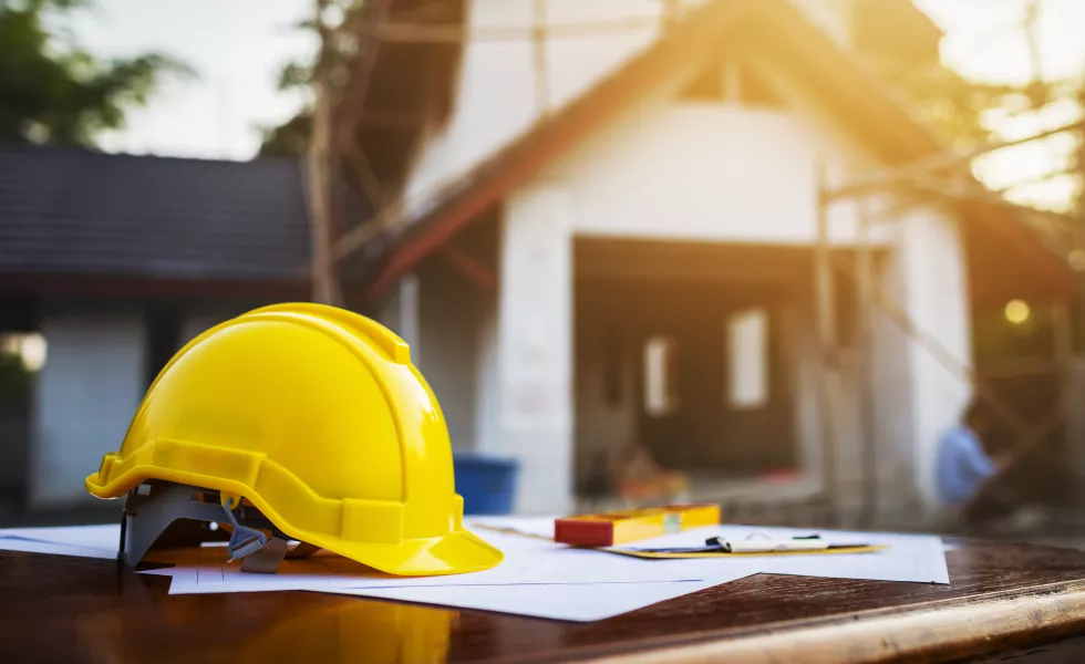 close-up-yellow-helmet-table-desk