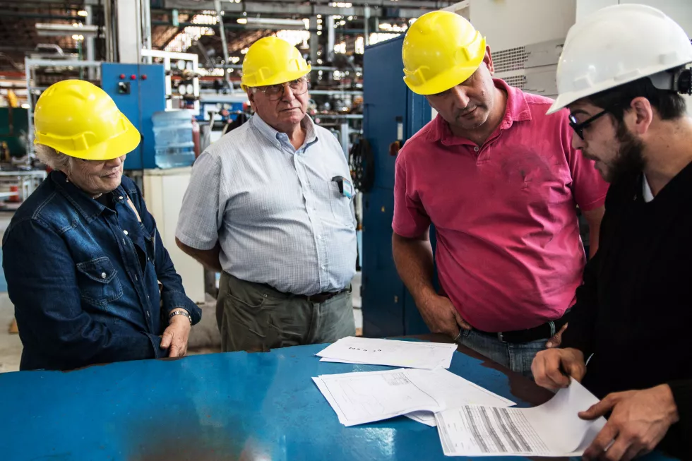 engineers-discussing-factory