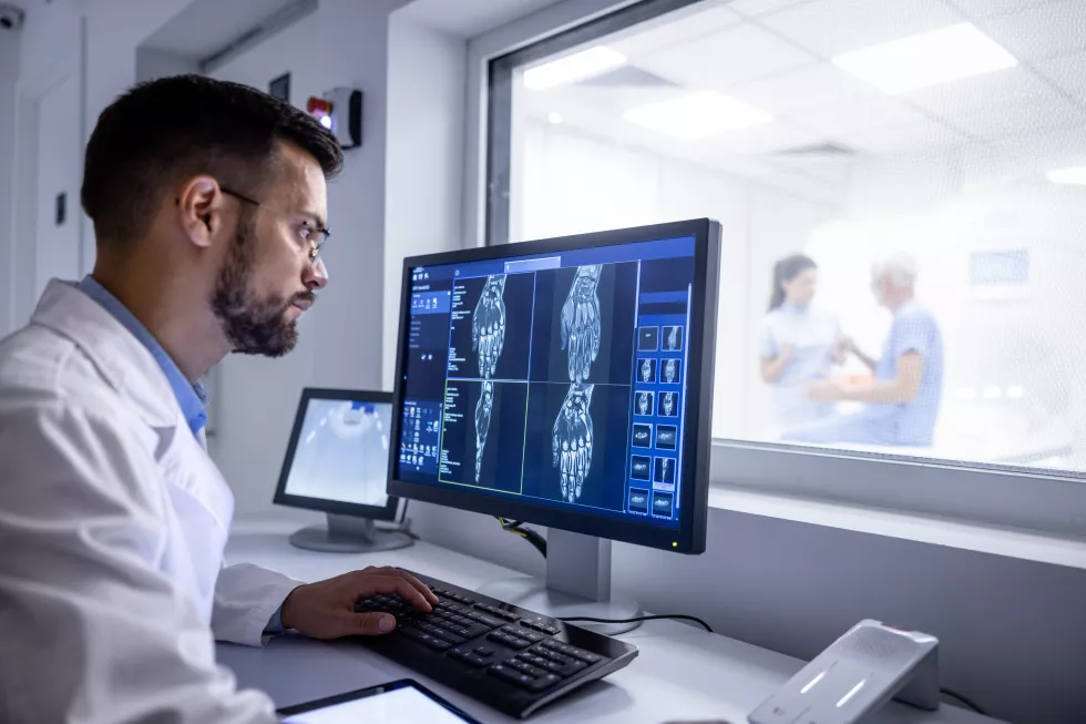mri-diagnostic-center-control-room-neurologist-examining-patient-xray-images-large-display