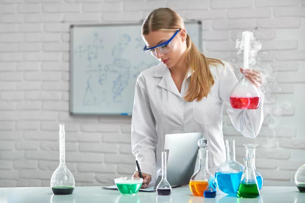 gorgeous-female-chemist-working-lab-testing-samples-2
