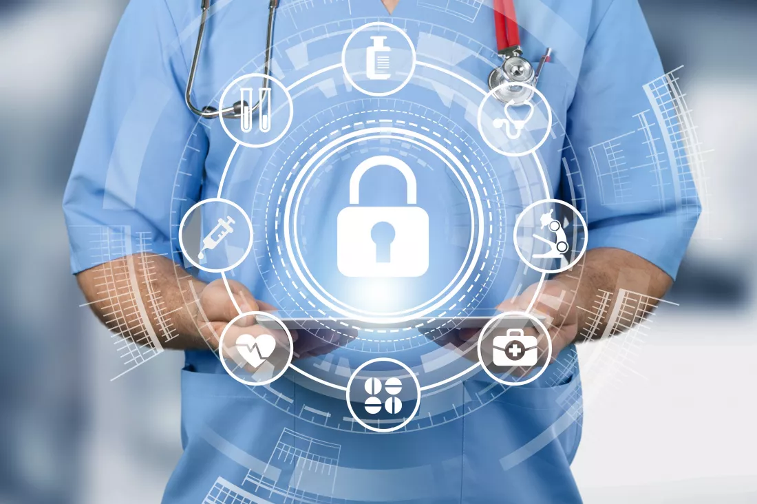 healthcare-cybersecurity-doctor-holding-digital-tablet