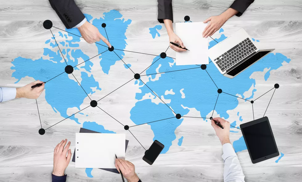 global-networking-wooden-desktop
