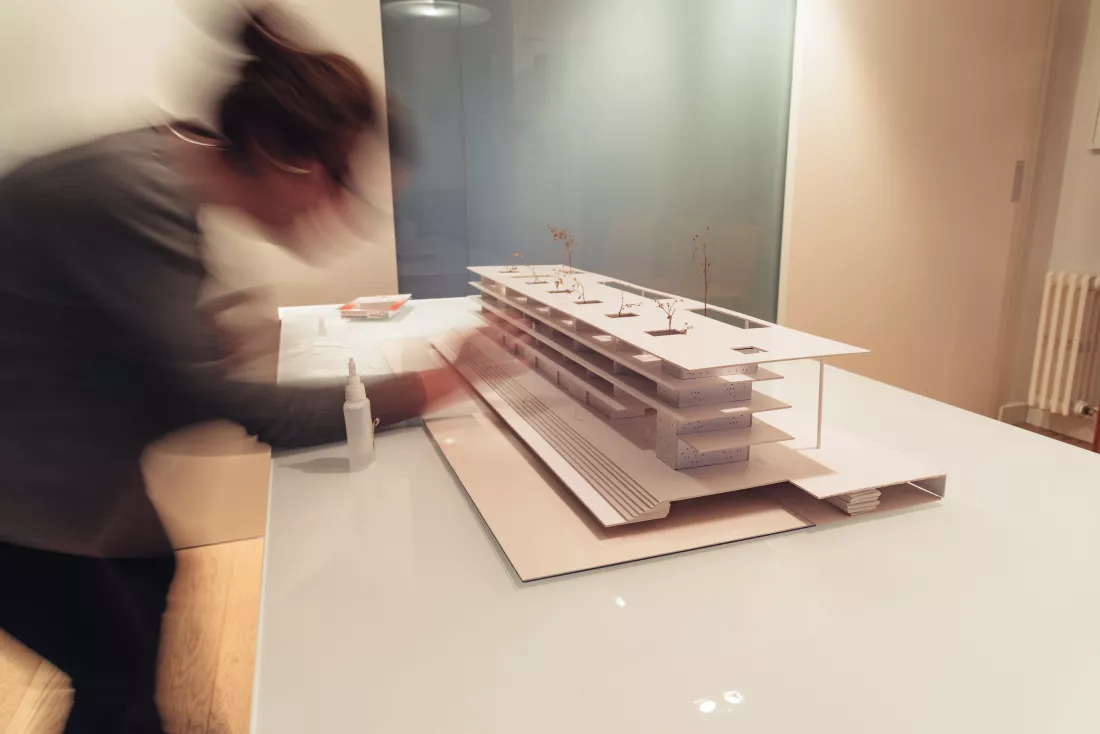 blurred-motion-architecture-making-model-table-office
