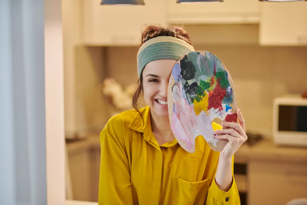 cute-female-artist-looking-happy-enjoyed
