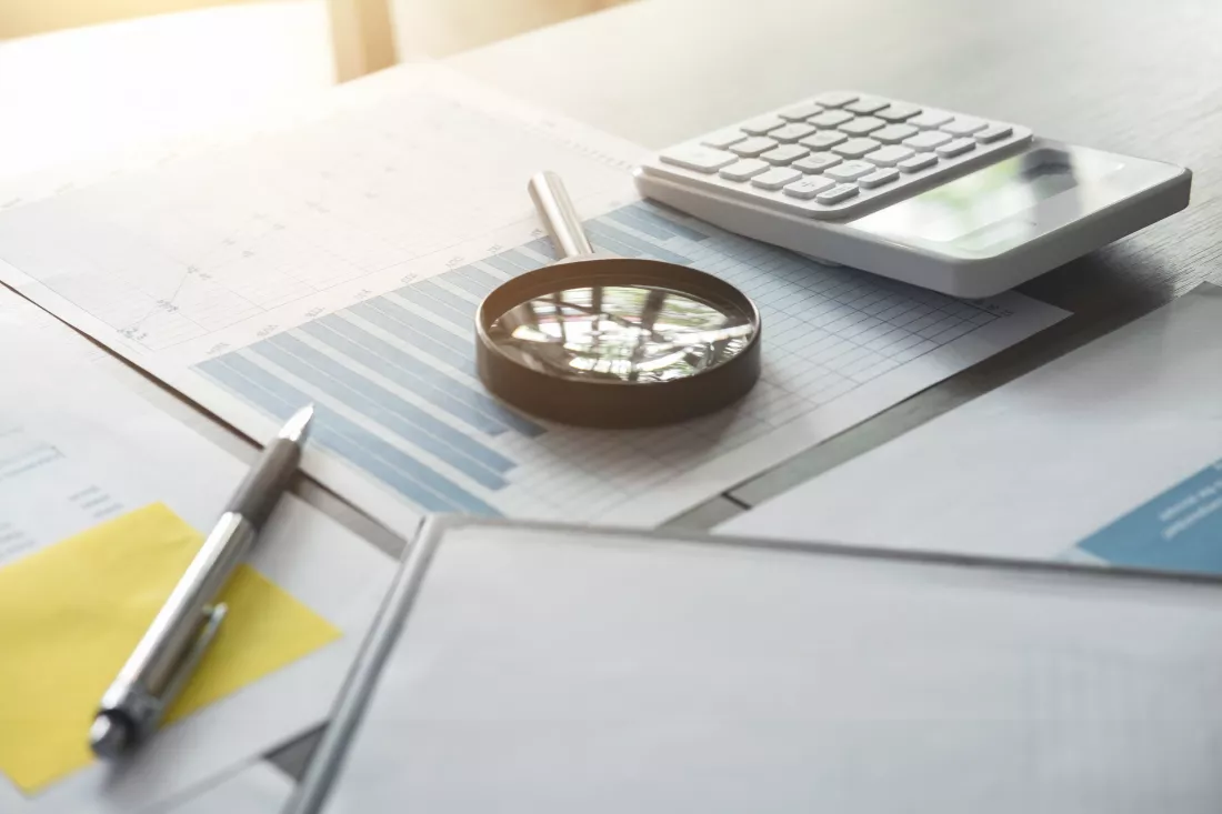high-angle-view-data-with-calculator-table