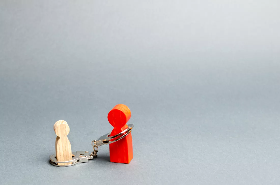 parent-is-handcuffed-child-concept-parental-debt-alimony-payment-custody