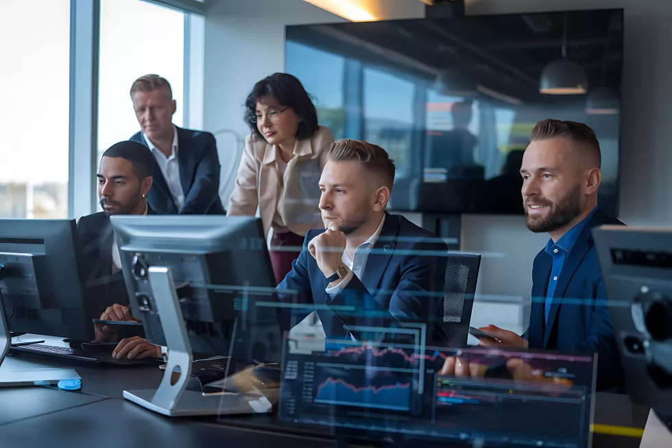 corporate-team-discussing-data-digital-screen