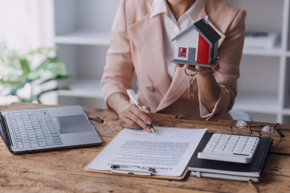 real-estate-broker-agent-presenting-consult-customer-decision-making-sign-insurance-form-agreement-buy-sell-home-model-concerning-mortgage-loan-offer-house-insurance