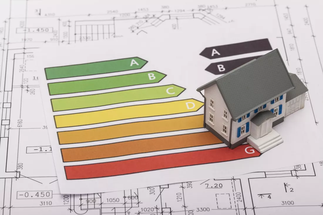 architects-model-house-with-plan-blueprints