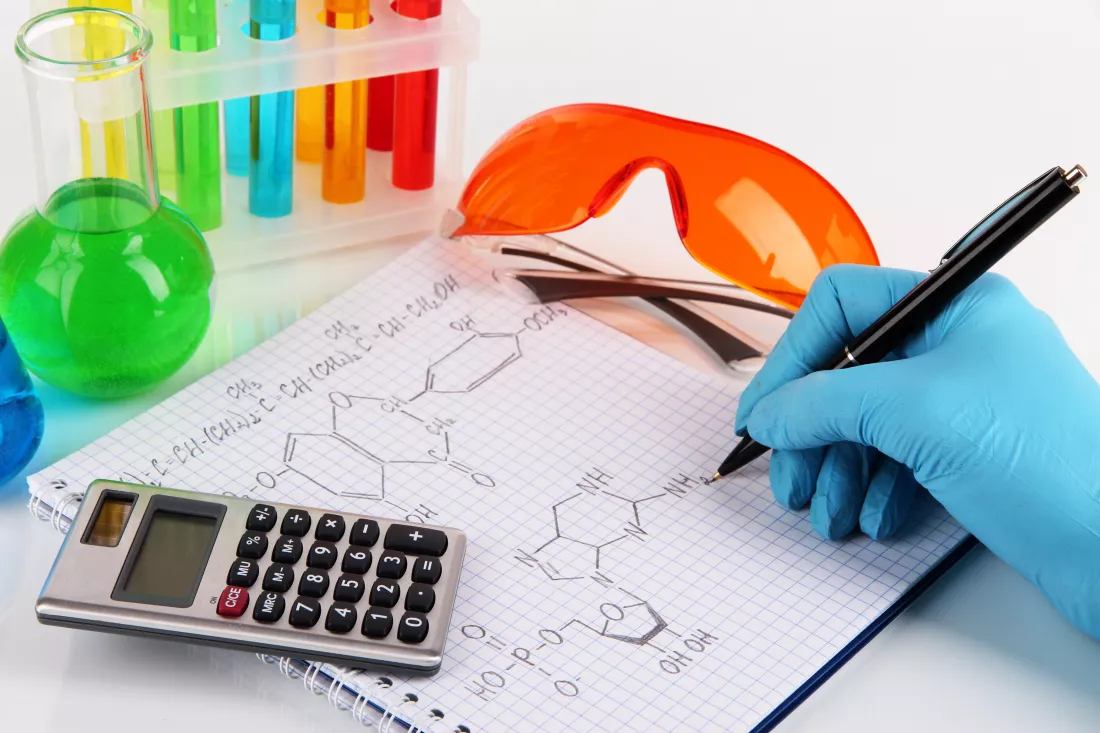 hand-scientist-writing-formulas-isolated-white